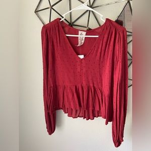 Red rayon blouse. Size medium.